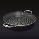 The HexClad 12&quot Hybrid BBQ Grill Pan on a black background